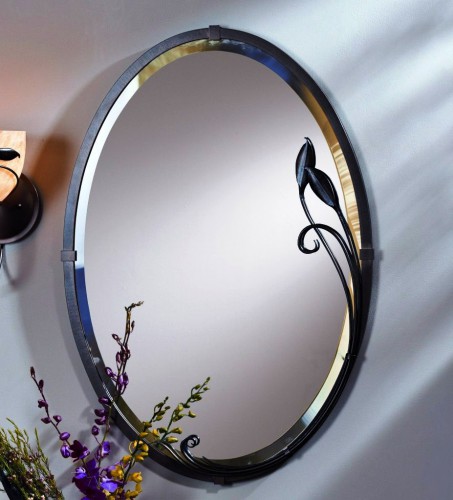 Овальное зеркало кованое с листьями фикуса